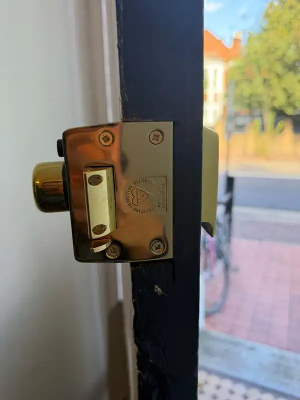 British Standard BS3621 night latch fitted to a timber front door on a Victorian Battersea street
