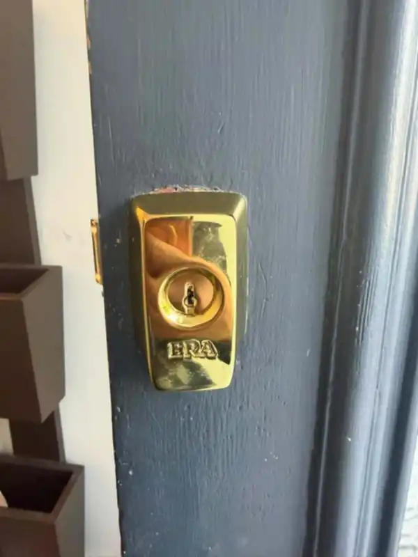 Brass ERA deadlock on a painted timber front door in Battersea