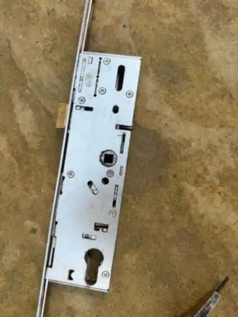 Multipoint lock gearbox and strip removed from a uPVC door in Battersea for diagnosis